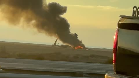 Engine Fire Engulfs Downed Helicopter