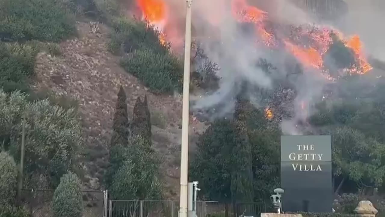 30k people flee the kill box as flames reach the getty museum....