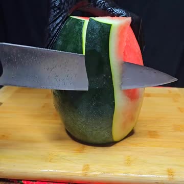 Beautiful black watermelon cutting skills