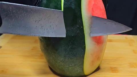 Beautiful black watermelon cutting skills