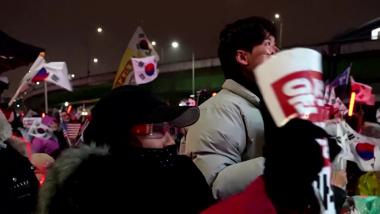 Young conservative man rallies to support South Korea’s Yoon