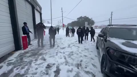 Members of Houston Fire Dept. and Police are having snowball fight in Texas