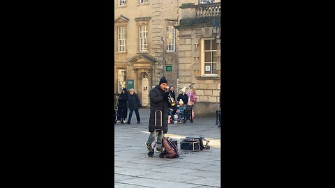 British man playing music instrument