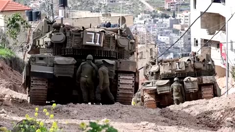 Israel stations tanks outside Jenin refugee camp in West Bank