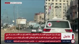 More footage of the Red Cross convoy heading for the three hostages.