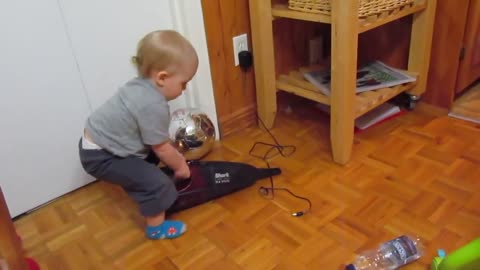 baby plays with dustbuster freaks out when it turns on