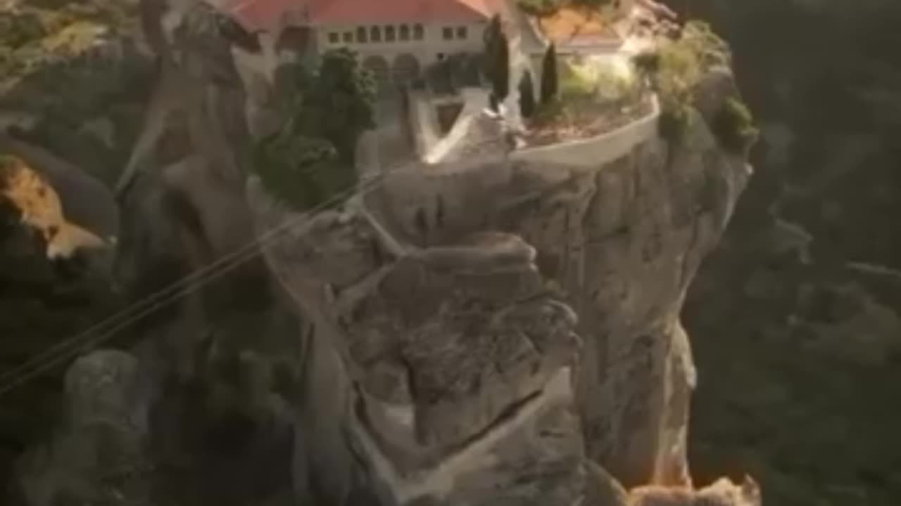 Greece's Cliffside Wonder 🌄✨