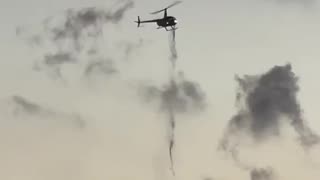 What is this helicopter dropping?