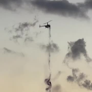 What is this helicopter dropping?
