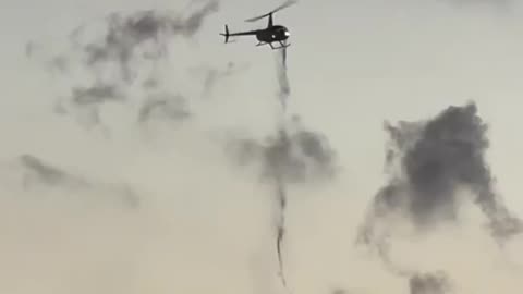 What is this helicopter dropping?