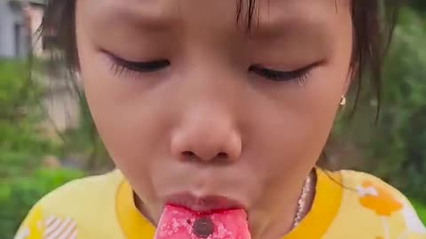 Kind girl eating watermelon ice cream 🍧 watermelon ice cream