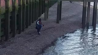 Fossickers on the banks of the Thames