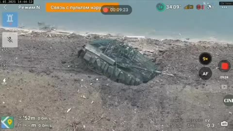 Russian Tank Gets Stuck in Large Hole