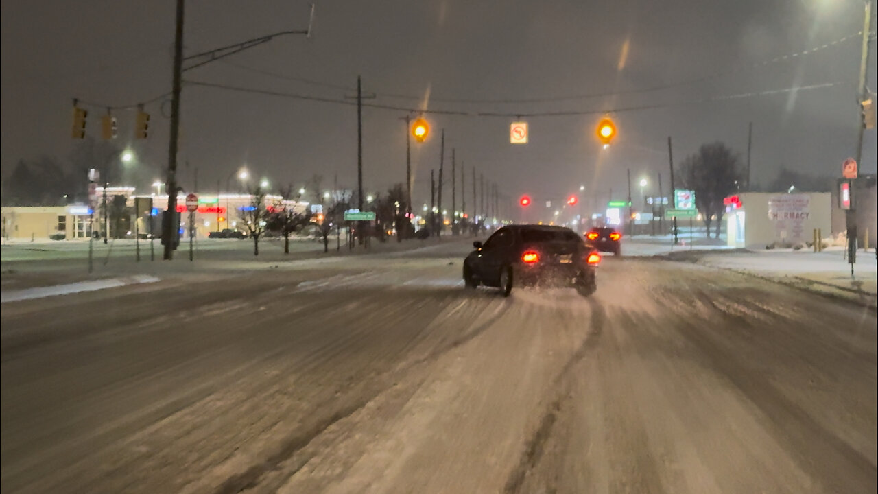 Police Pull Over Snow Drifter Amid Winter Storm in Southeast Michigan