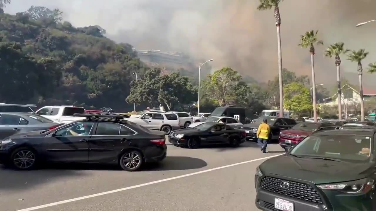 Several residences on fire from the Pacific Palisades Brush fire in California