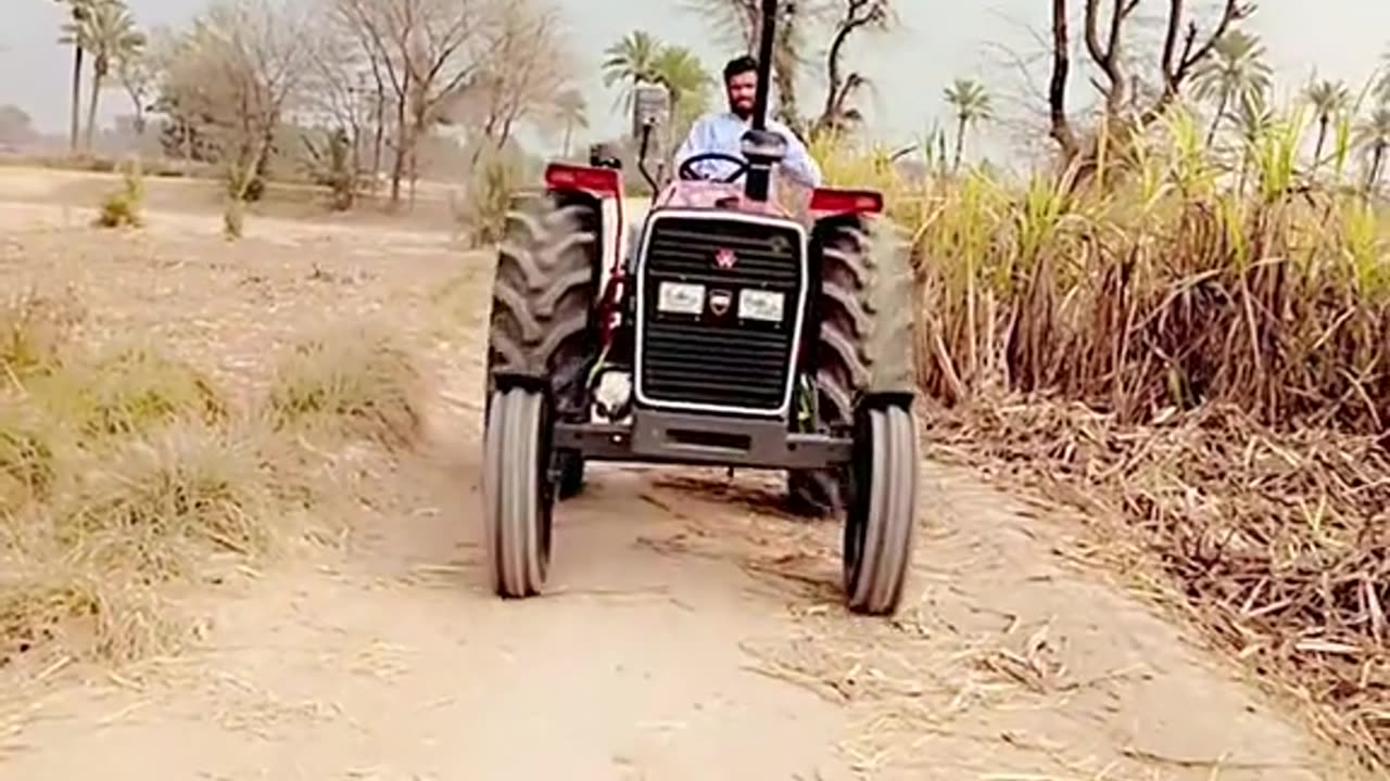 Rural Tractor Ride on a Dusty Path