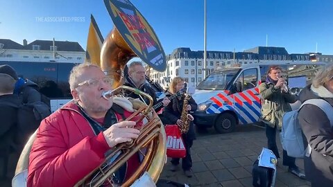 Climate activists from Extinction Rebellion block major road in the Hague