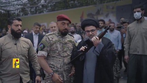 Hezbollah's new leader has just appeared in a promo video kissing an AK-47