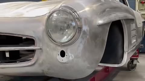 Completing the metalwork on the Mercedes-Benz 300SL Gullwing using a Celette frame rack