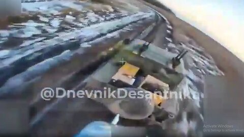 A Russian fiber-optic drone hit a Ukrainian vehicle with an electronic warfare system mounted on top