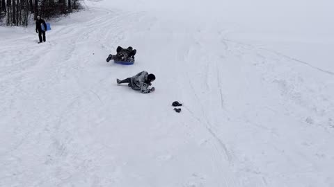 Falling Down Chasing A Sled