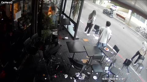 Surveillance camera footage shows the stabbing attack in Tel Aviv this afternoon