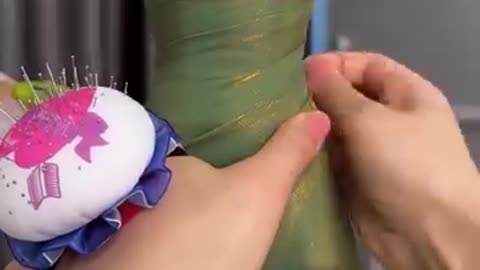 Check out this skilled fashion designer making the cutest dress!