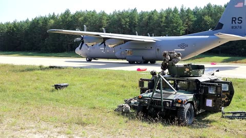 C-130J lands on makeshift runway to deliver Humvee!