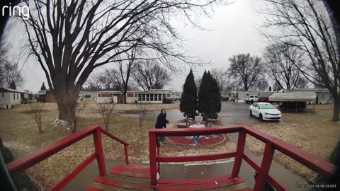 Woman Slides Down Icy Steps