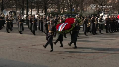 Vladimir Putin laid a wreath at the Tomb of the Unknown Soldier near the Kremlin wall.