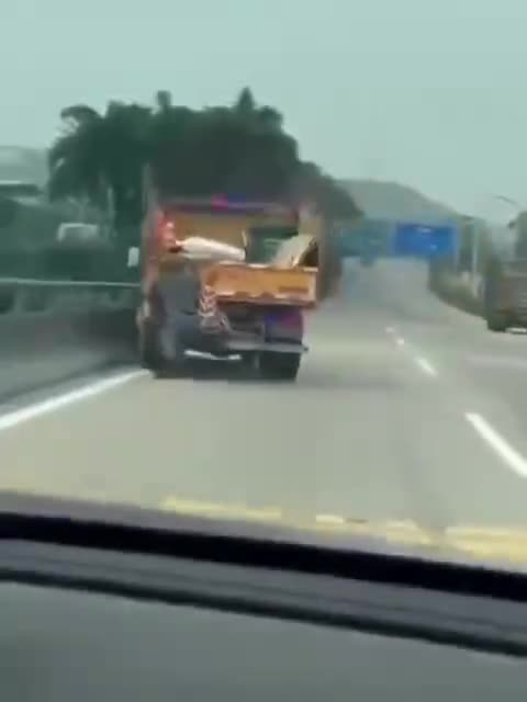 The man is holding the truck and refused to let it go.