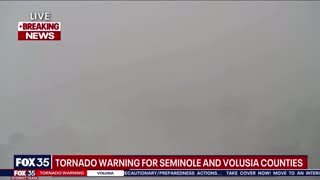 Tower cam captures debris flying as tornado approaches the FOX 35 Orlando