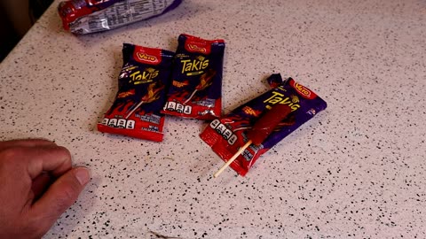 Takis Flavored Dipping Pop Unusual Candy Review