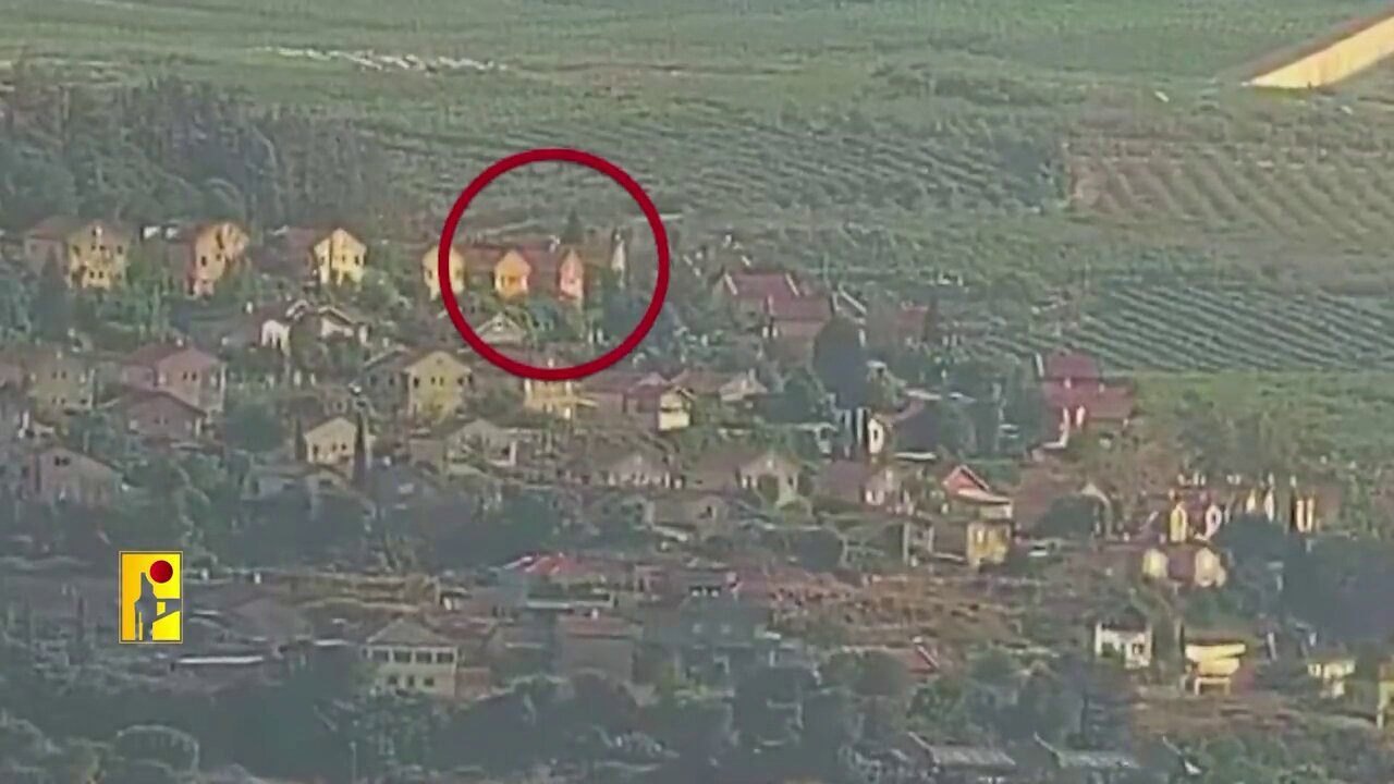 Hezbollah attacking civilian buildings that were used by israeli army soldiers in Metulla