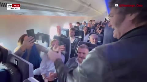 Javier Milei flies commercial and greets passengers one by one