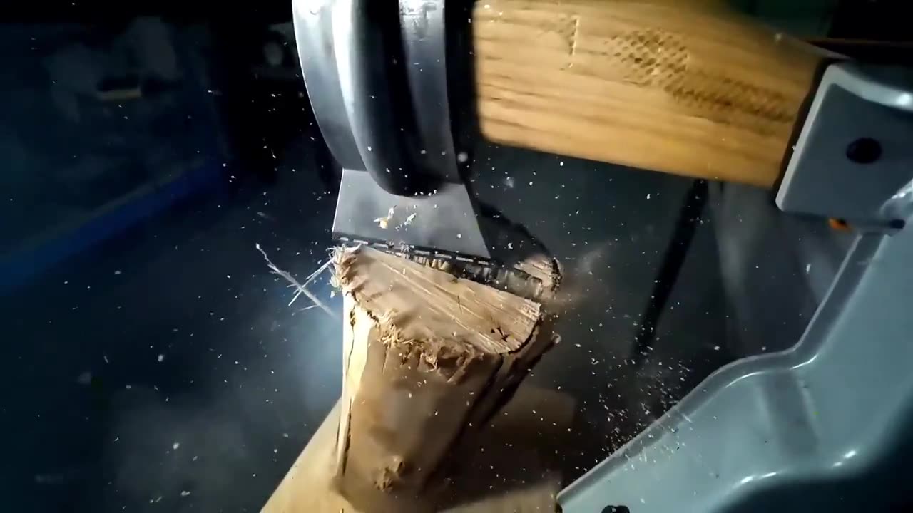 Shotgun cartridge powered axe