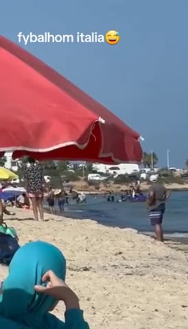 In italy muslim immmigrants laugh as african immigrants arrive on boat