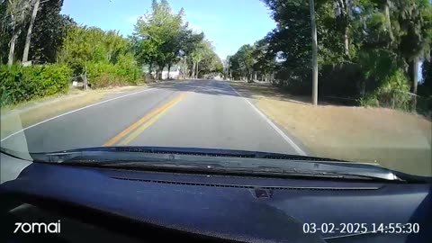 White Car Ran Stop Sign Causing Crash