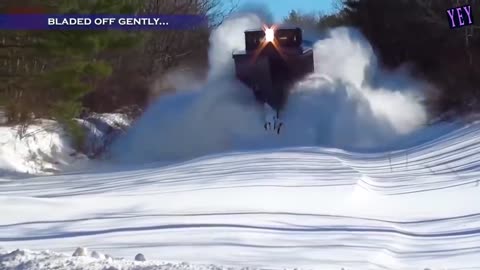 Most awesome train moving through snow