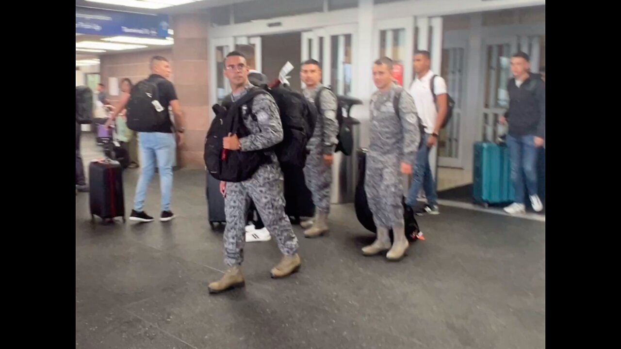 Colombian military soldiers at SA airport asked them what they were doing here.