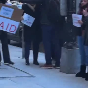 Fired USAID Marxists carry the ‘box of shame’ as they exit headquarters for last time.