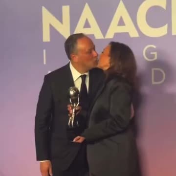 Kammy backs away quickly from Doug’s kiss.