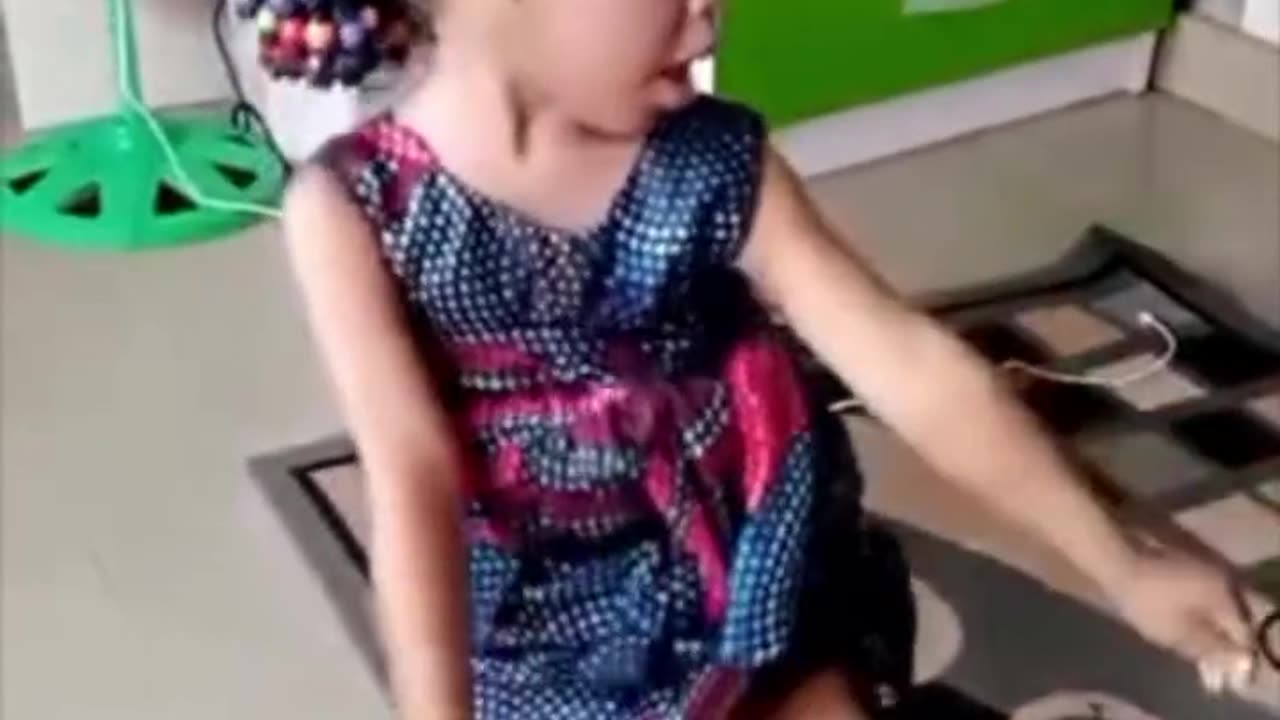 What is this little girl doing