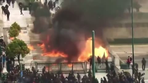 Protesters in Athens, Greece throw bombs at police