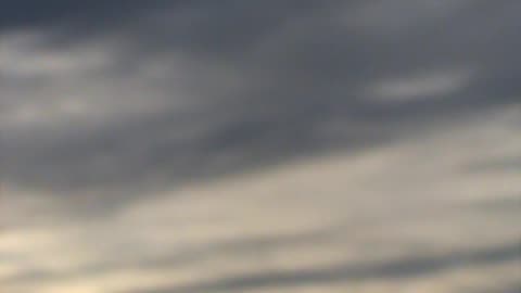 UFO coming out of the clouds