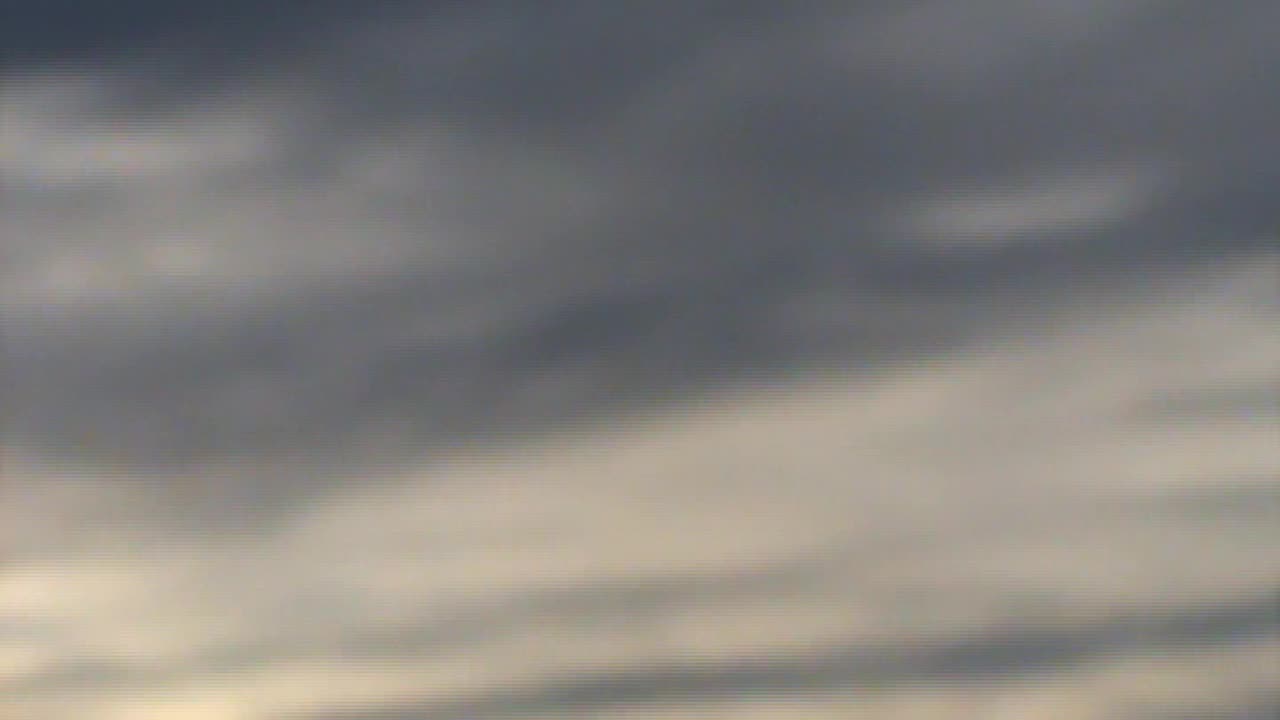 UFO coming out of the clouds