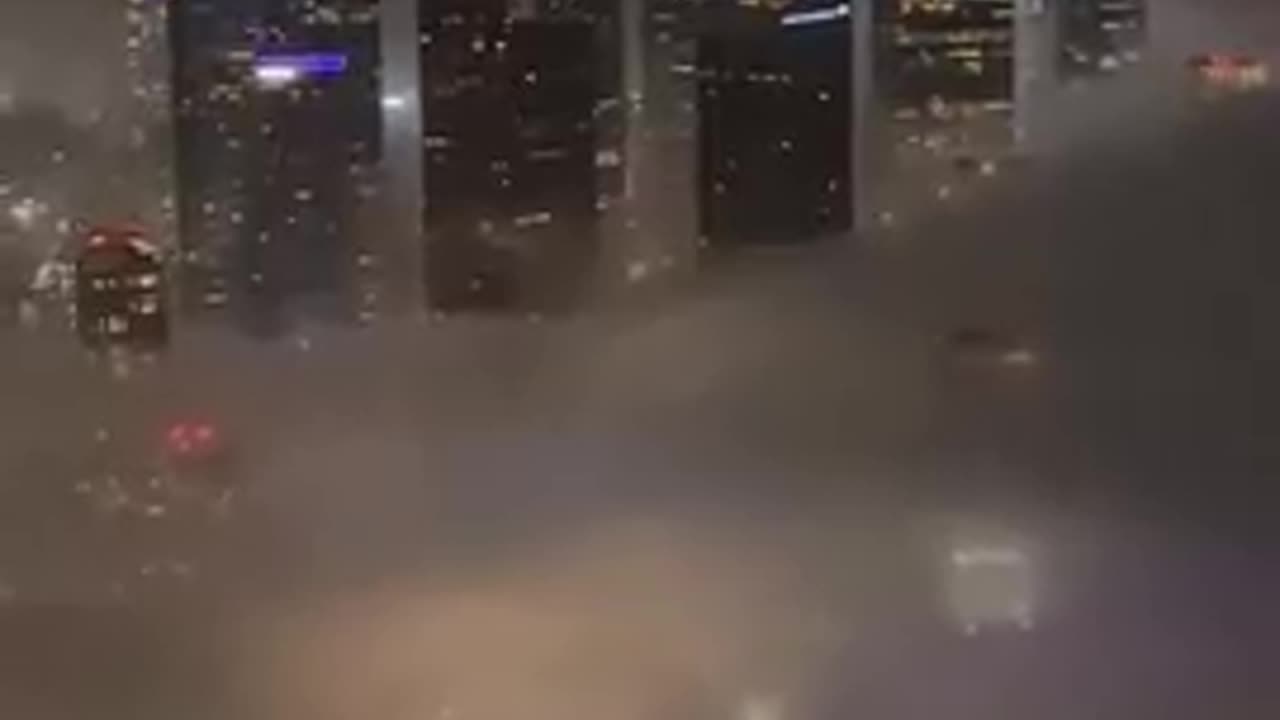 An aerial view reveals a thick fog blanketing parts of Los Angeles, California