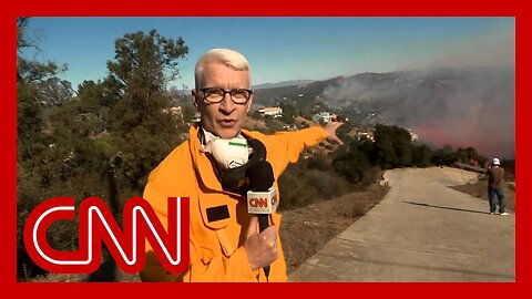 Anderson Cooper catches helicopters in active battle to save Topanga Canyon homes from wildfires