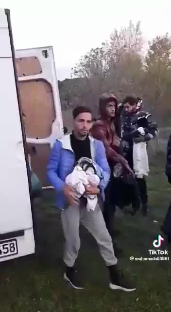 Video showing illegal migrants jumping out of a van in northern France.