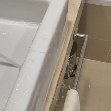 Hotel Sink Sprays Water Over Basin